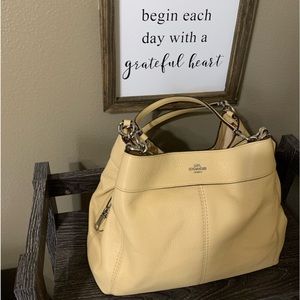 Buttery yellow Coach satchel